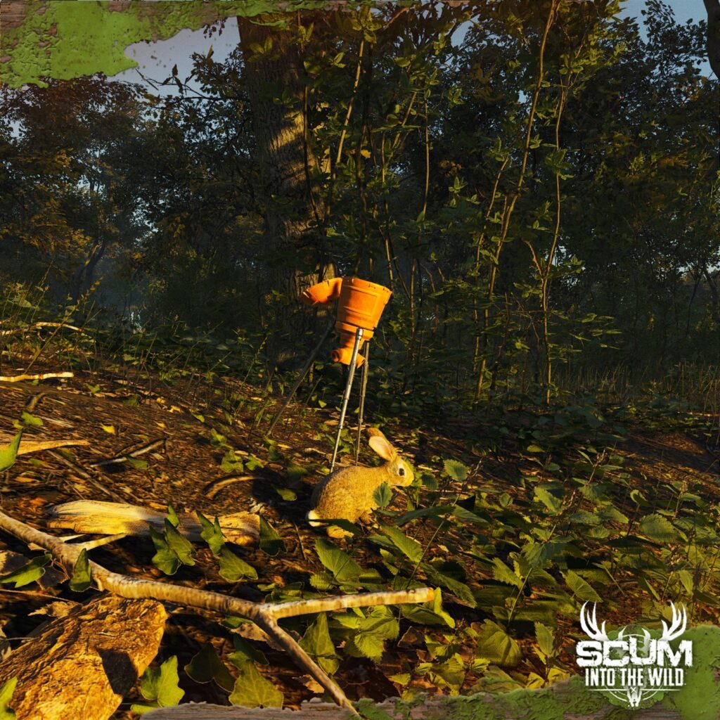 SCUM gameplay screenshot showing a rabbit near a deployable bait feeder in a forest.