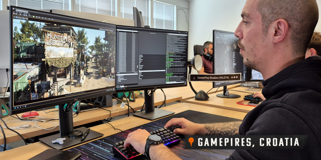 A Gamepires developer in Croatia working on SCUM at his desk.